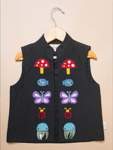 Front close-up of a boys sleeveless black embroidered vest for traditional Indian wear by StorytellersJunior.