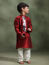 Boy wearing Storytellers Junior Rishi Ruby Mirror Kurta Set in red silk with mirror-work detailing