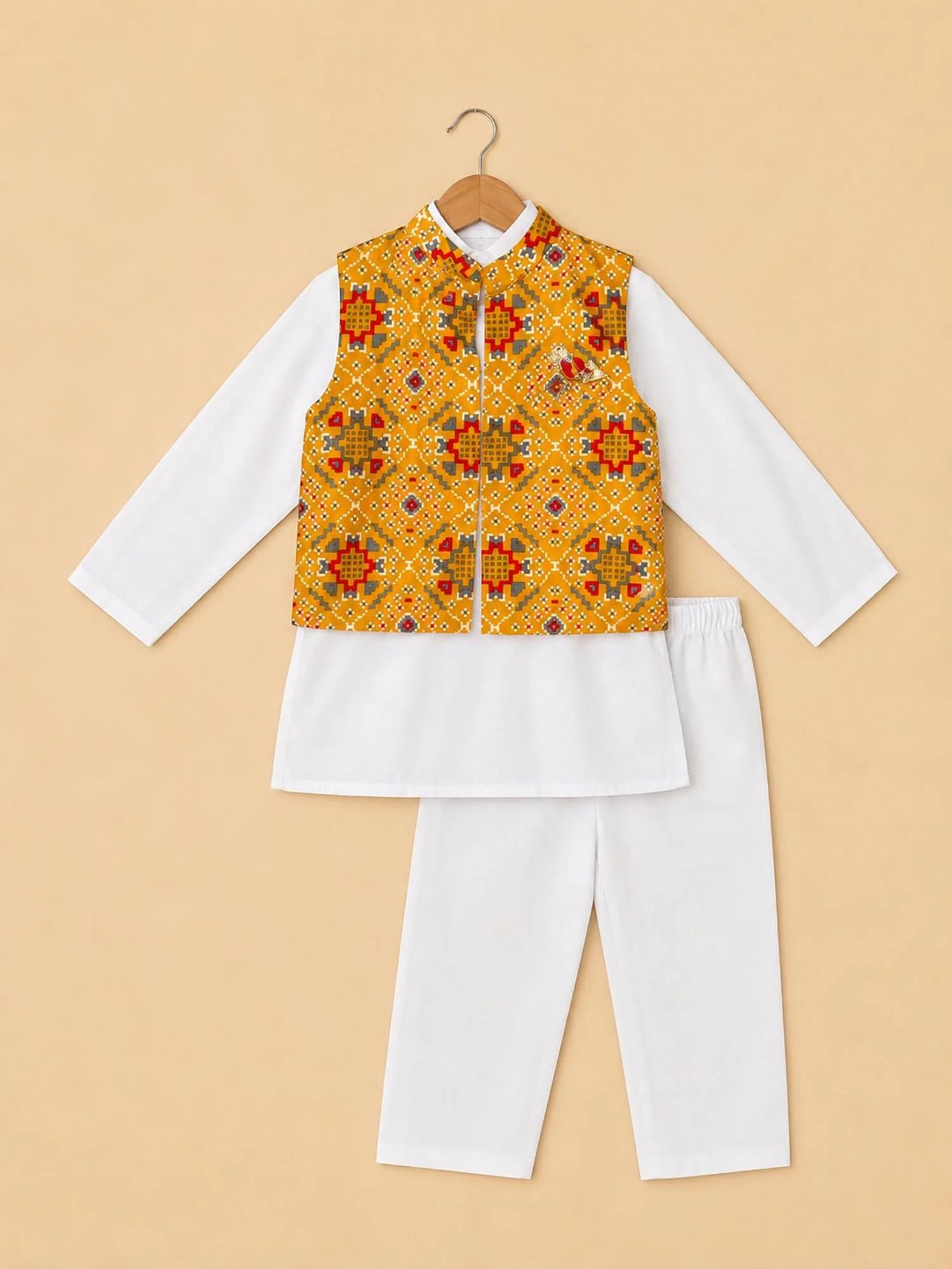 Boy wearing Storytellers Junior Kabir Patola Nehru Jacket Set in white and mustard
